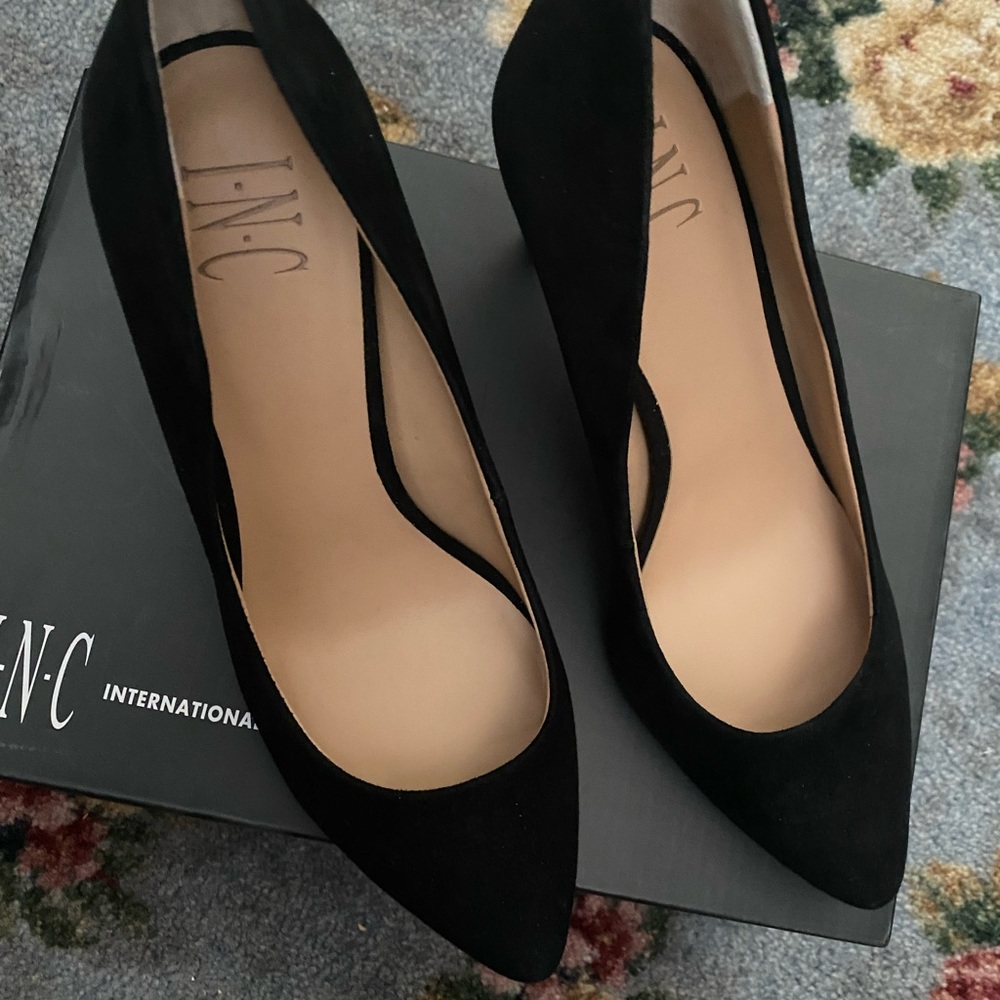 Gently worn black suede pumps